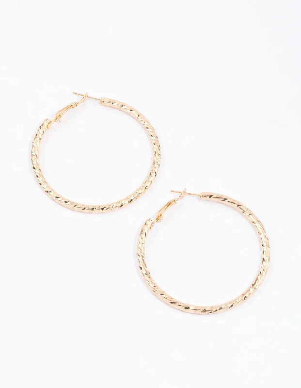 Best hoop earrings with intricate beaded details for a textured, stylish appearance-Gold Diamond Cut Hoop Earrings