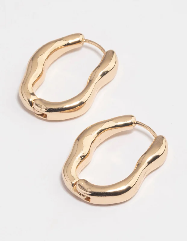 Best hoop earrings with baroque pearls for a luxurious and elegant vibe-Gold Molten Oval Huggie Earrings