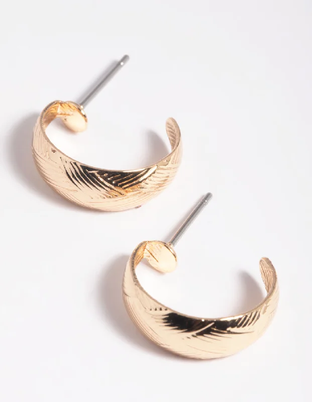 Best hoop earrings with oval shapes for a unique and elongated design-Gold Woven Huggie Hoop Earrings