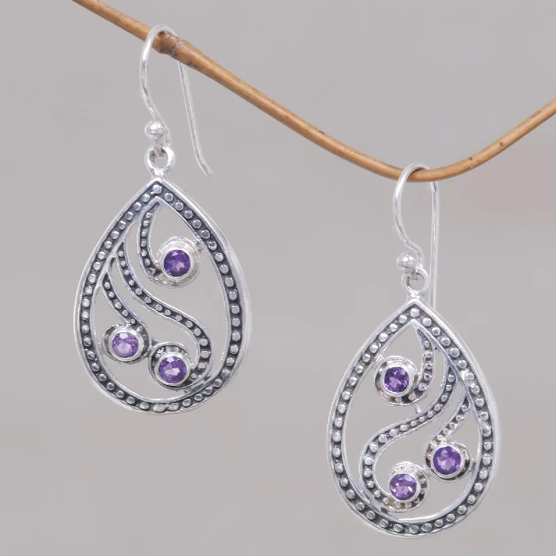 Hoop earrings with oversized designs for a bold, fashion-forward statement-Peacock Feather Handcrafted Balinese Sterling Silver and Amethyst Earrings