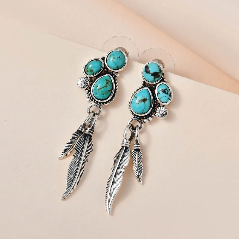 Hoop earrings with rhinestone-studded rims for a glamorous touch-Sterling Silver Turquoise Dangle Earrings