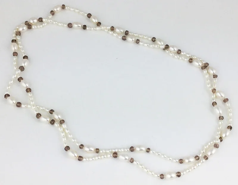 Necklaces and pendants with geometric pendants for a clean, contemporary design-Egg Pearl + Champagne Garnet Bead Rope Necklace