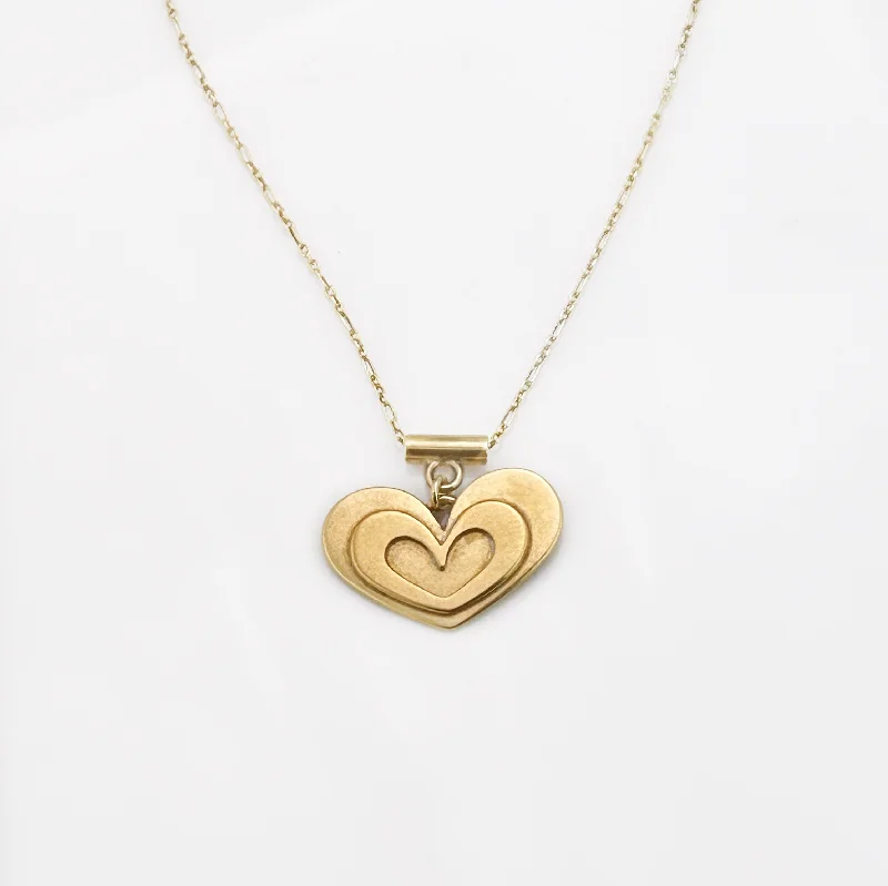 Best necklaces and pendants with glowing moonstone for an ethereal glow-Gold Nesting Heart Pendant Necklace