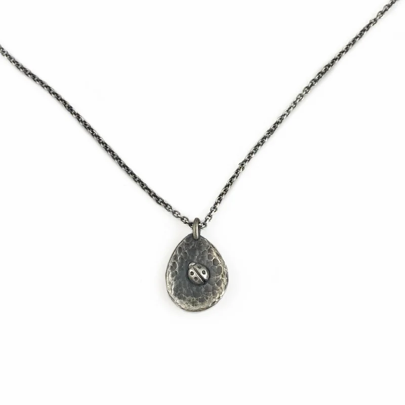 Best necklaces and pendants with zodiac signs for a celestial, astrology-inspired vibe-Pebble Necklace with Ladybug