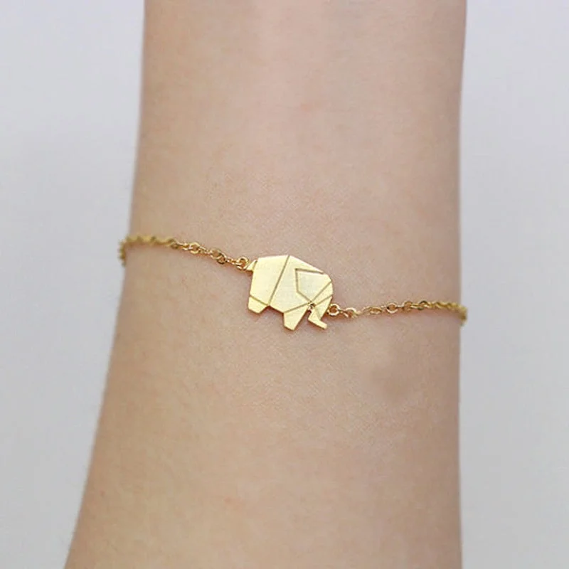 Simple bangle bracelets with smooth matte finishes for a subtle and modern style-Delicate Petite Origami Elephant Bracelet