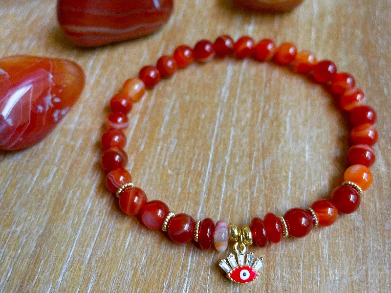 Best bangle bracelets with bright enamel colors for a fun and youthful style-6mm Carnelian Beaded Bracelet || Red Evil Eye Charm || Reiki Infused