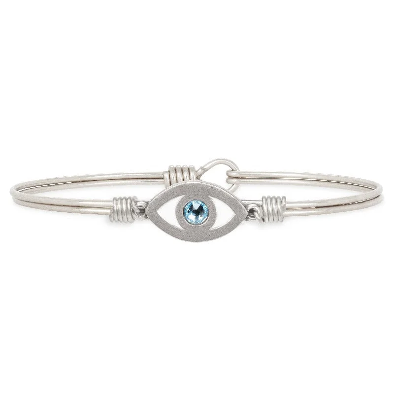 Vintage-inspired bangle bracelets with etched detailing for a timeless, antique look-Luca and Danni Evil Eye Silver Bangle Bracelet